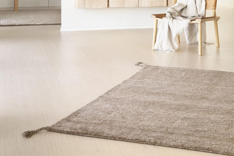 Wollteppich Uni von Woodnotes in der Farbe camel, Detailansicht